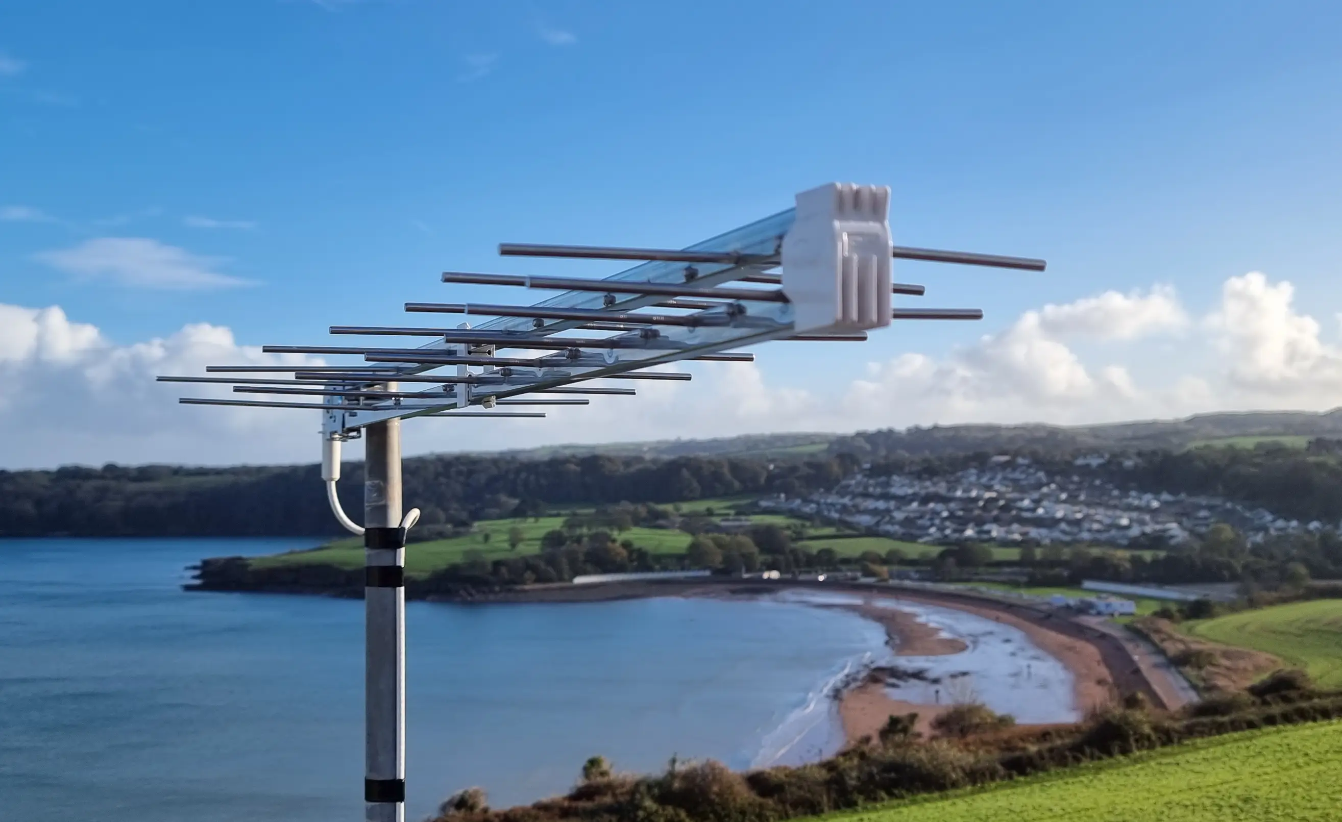 tv aerial broadsands Skilled technician repairing a broken TV aerial on a chimney in Paignton, South Devon