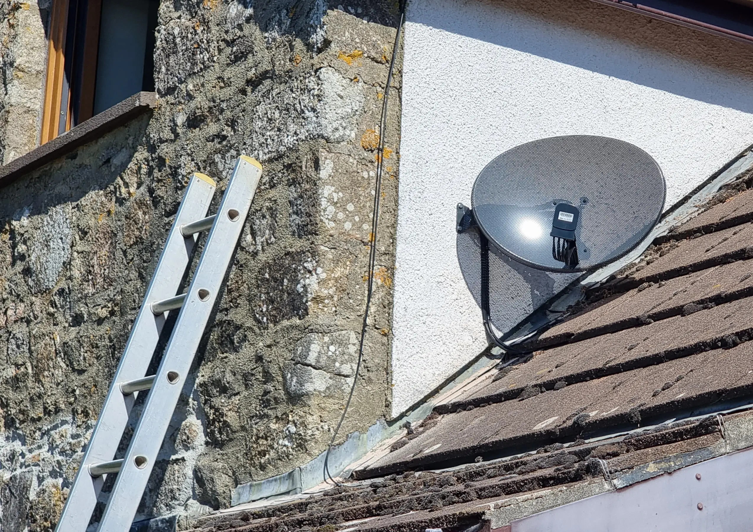 satellite dish install Professional satellite dish installation on a roof in Torbay, with clear line of sight to the sky