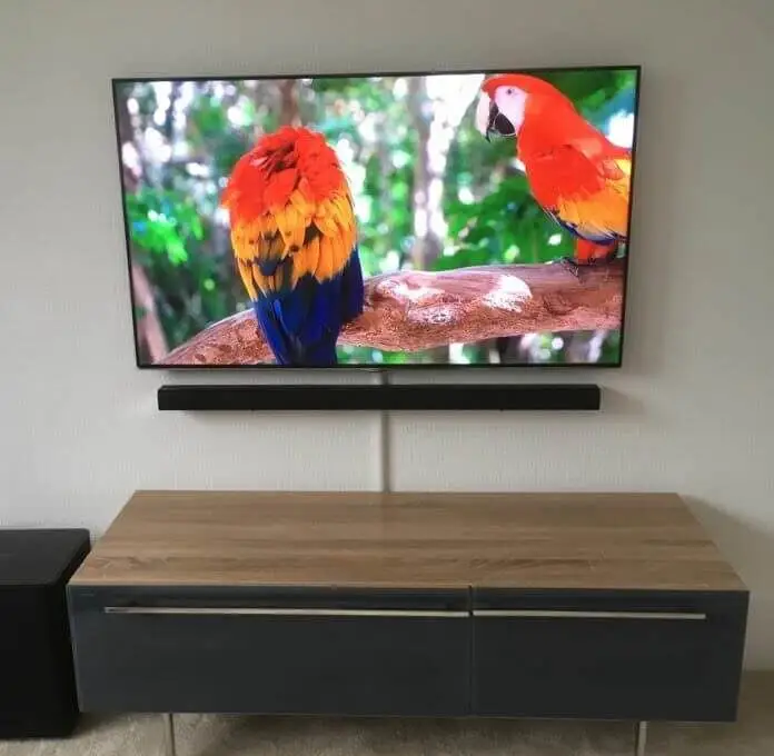 trunked tv Torbay Digital technician mounting a TV bracket on a bedroom wall in Brixham for optimal viewing