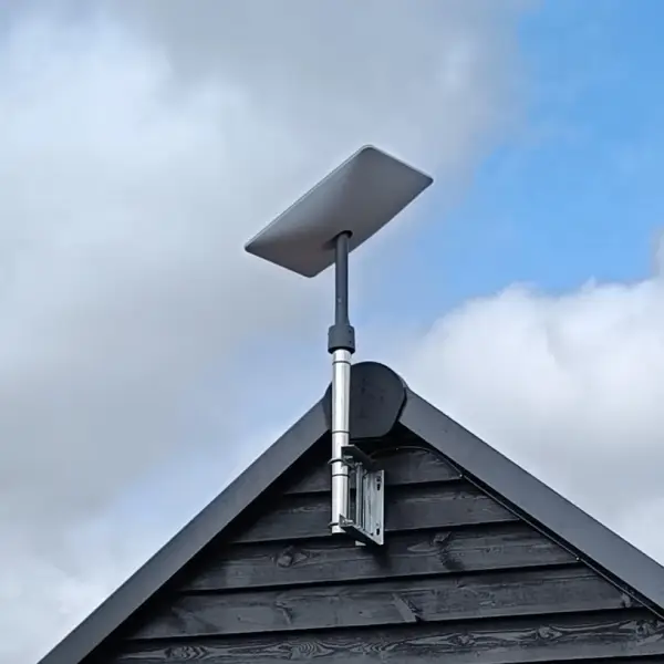 starlink on pole mount Customer's home in Torbay with a newly installed Starlink dish on the roof, offering fast and reliable satellite internet service